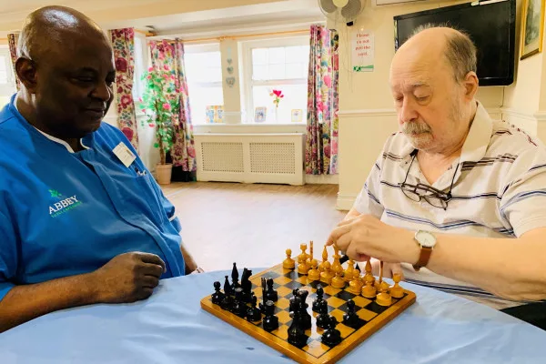 Residents enjoying a game of Scrabble in the communal area